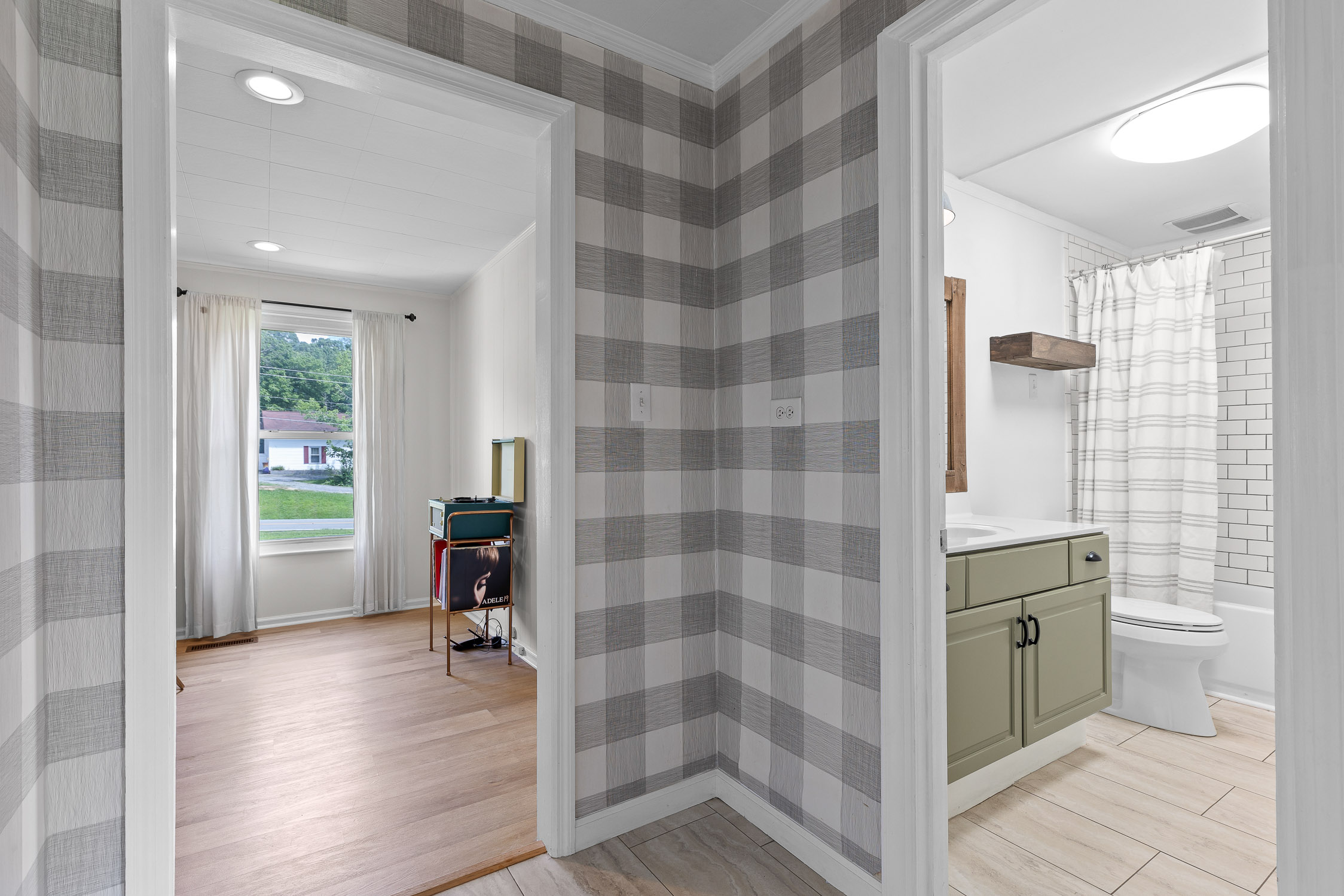 Hallway with stylish wallpaper